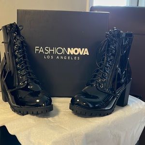 Never worn black patent leather boot